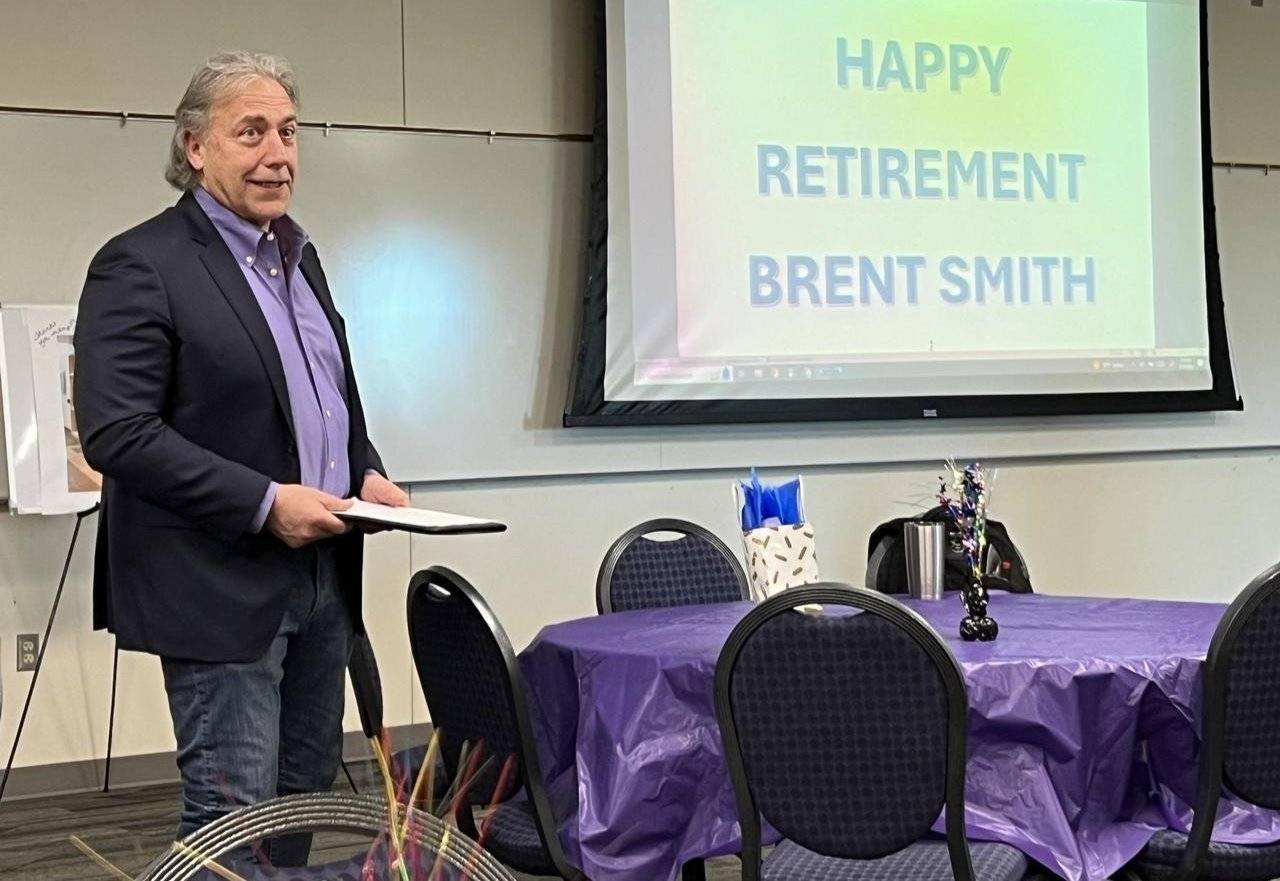 Brent Smith standing in front of room talking